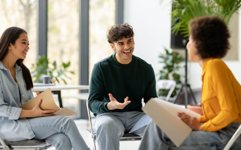 teamwork-concept-international-students-talking-a-2023-11-27-05-02-46-utc-1.jpg